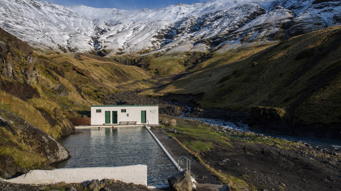 The Seljavallalaug geothermal pool, located in southern Iceland, perfect getaway for Easter