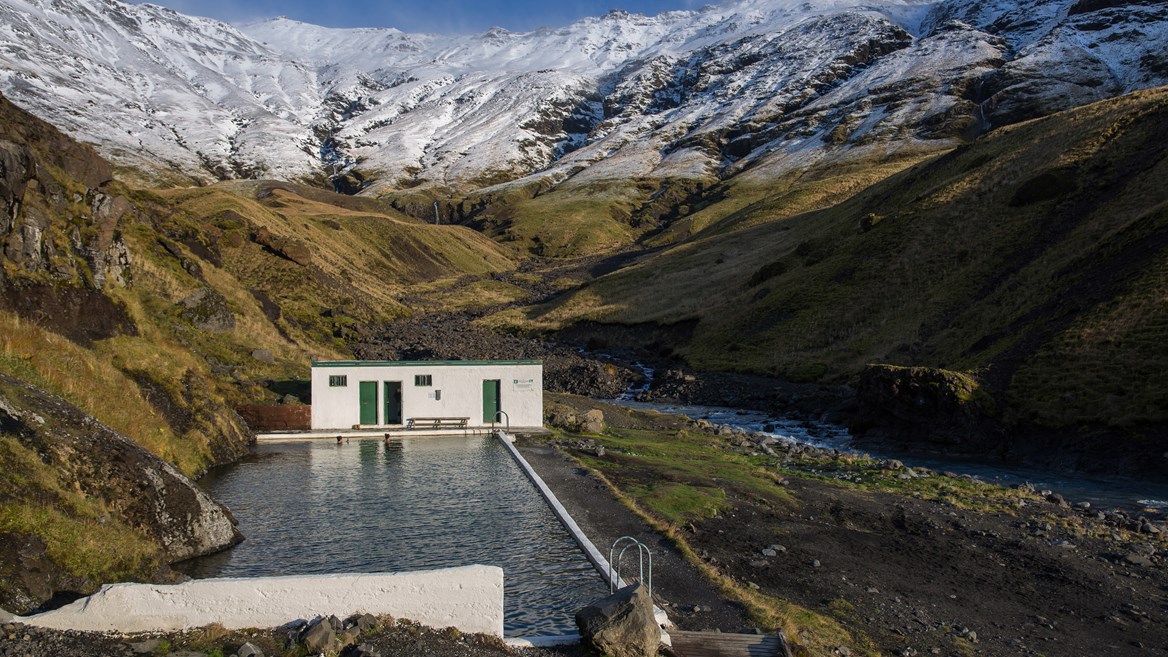 The Seljavallalaug geothermal pool, located in southern Iceland, perfect getaway for Easter