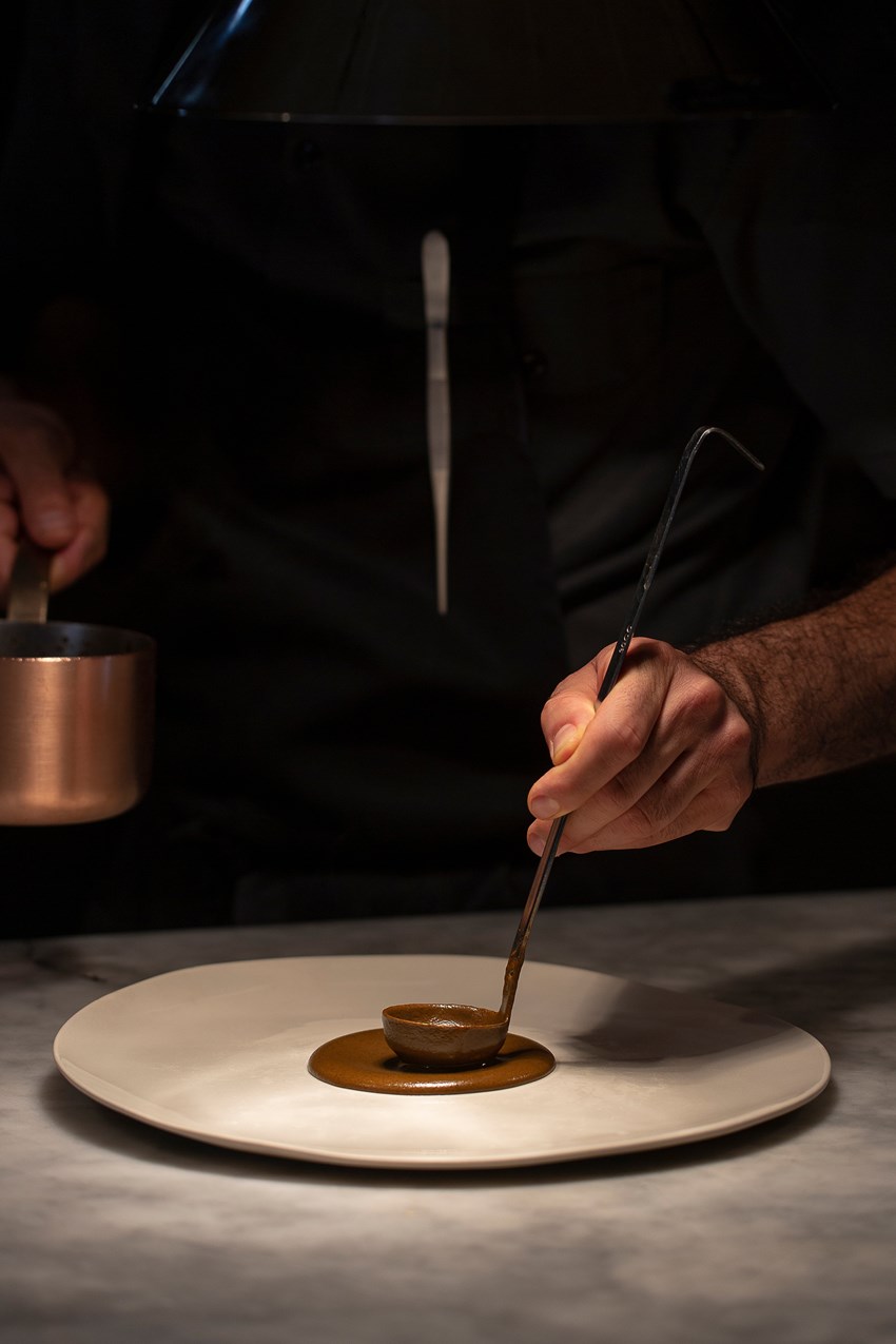 Taste Enrique Olvera’s Pujol mole, the most traditional dish in Mexican gastronomy.