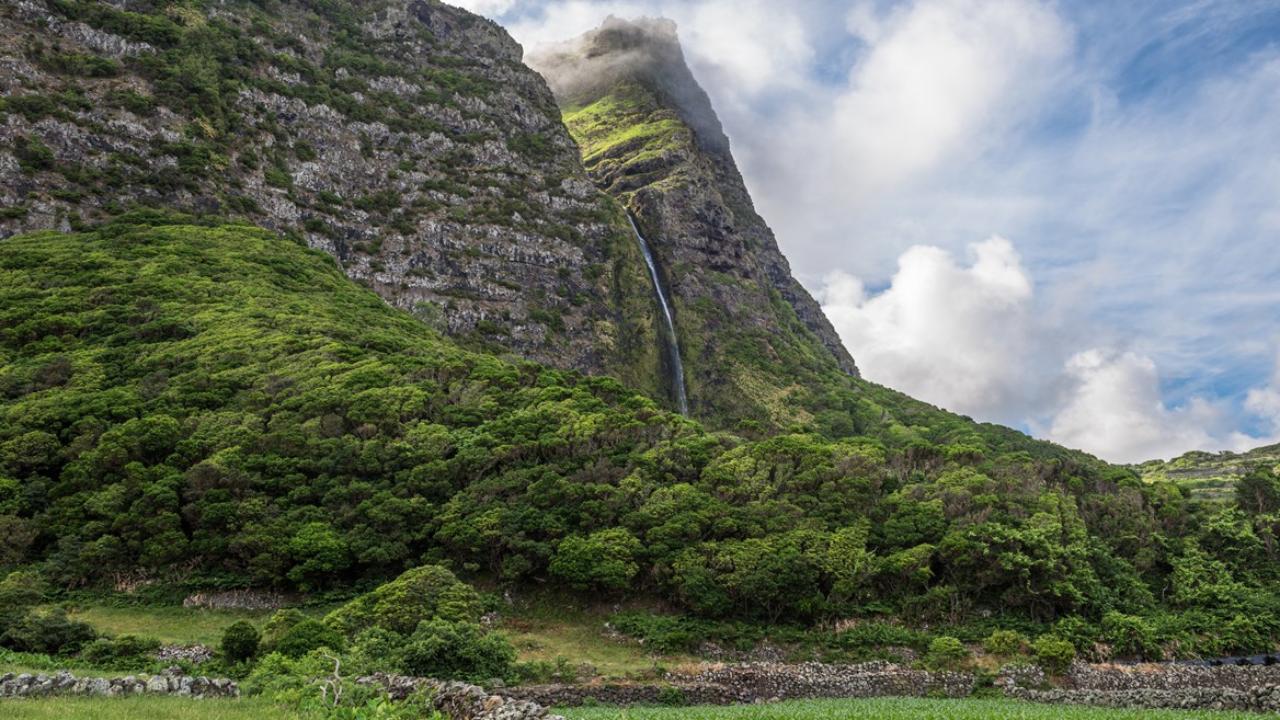 Flores Island in the Azores is famous for its waterfalls. Don’t miss the Poço de Bacalhau waterfall in Ponta de Faja.