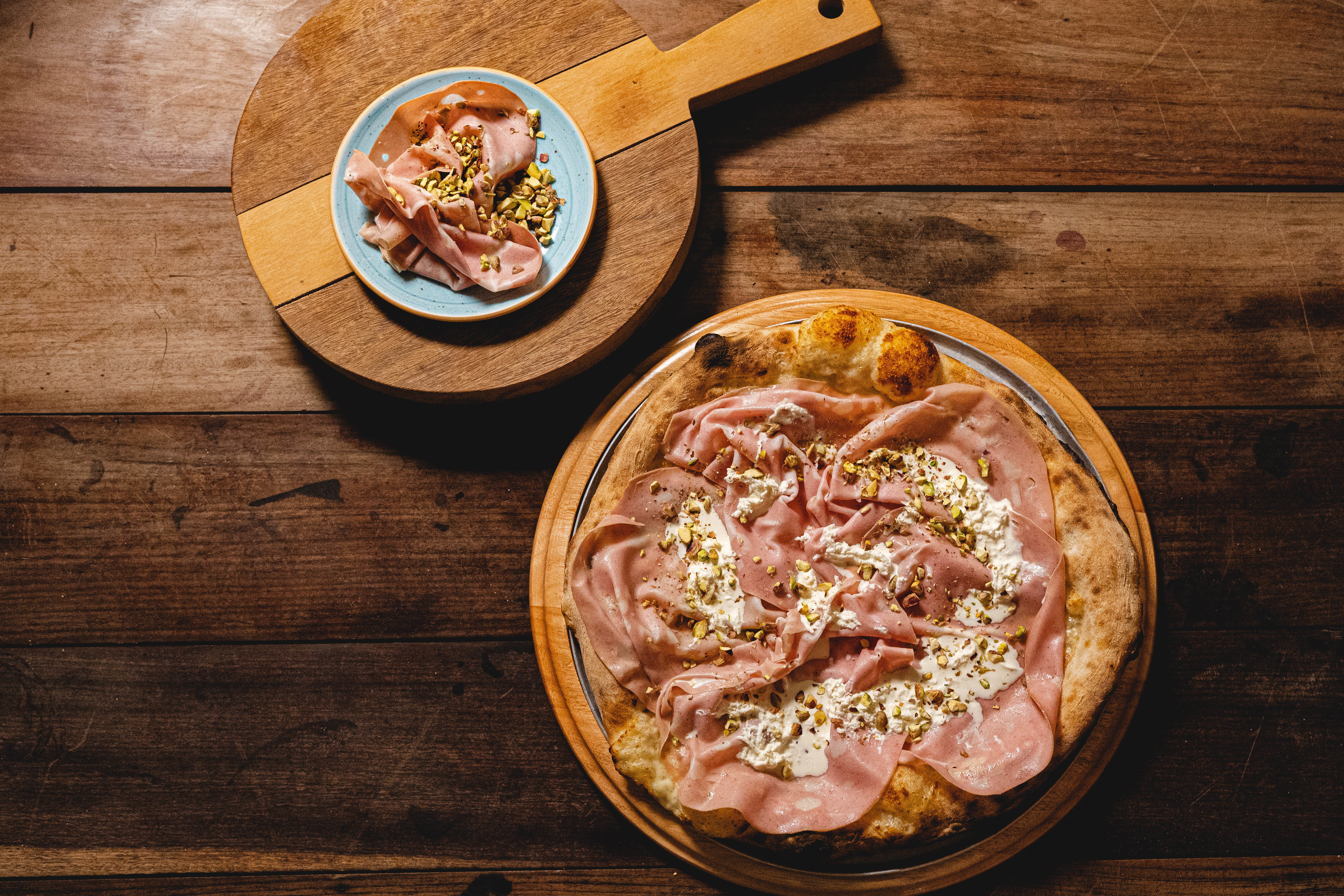San Paolo sirve pizzas al estilo brasileño, con ingredientes de productores locales como la mortadela y la burrata, en Madrid.