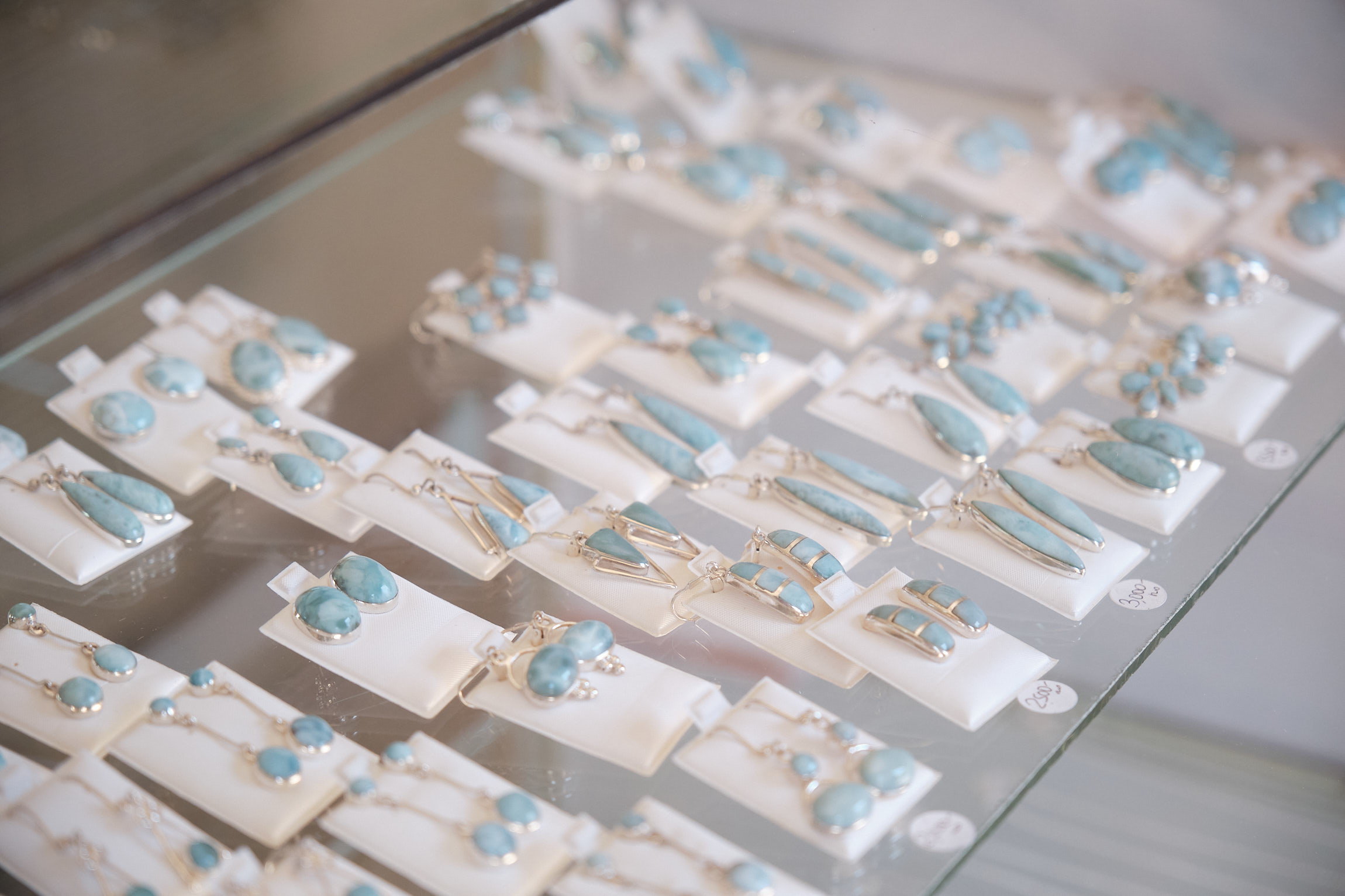 Larimar earrings designed by jewellers at Fleury Artesanías