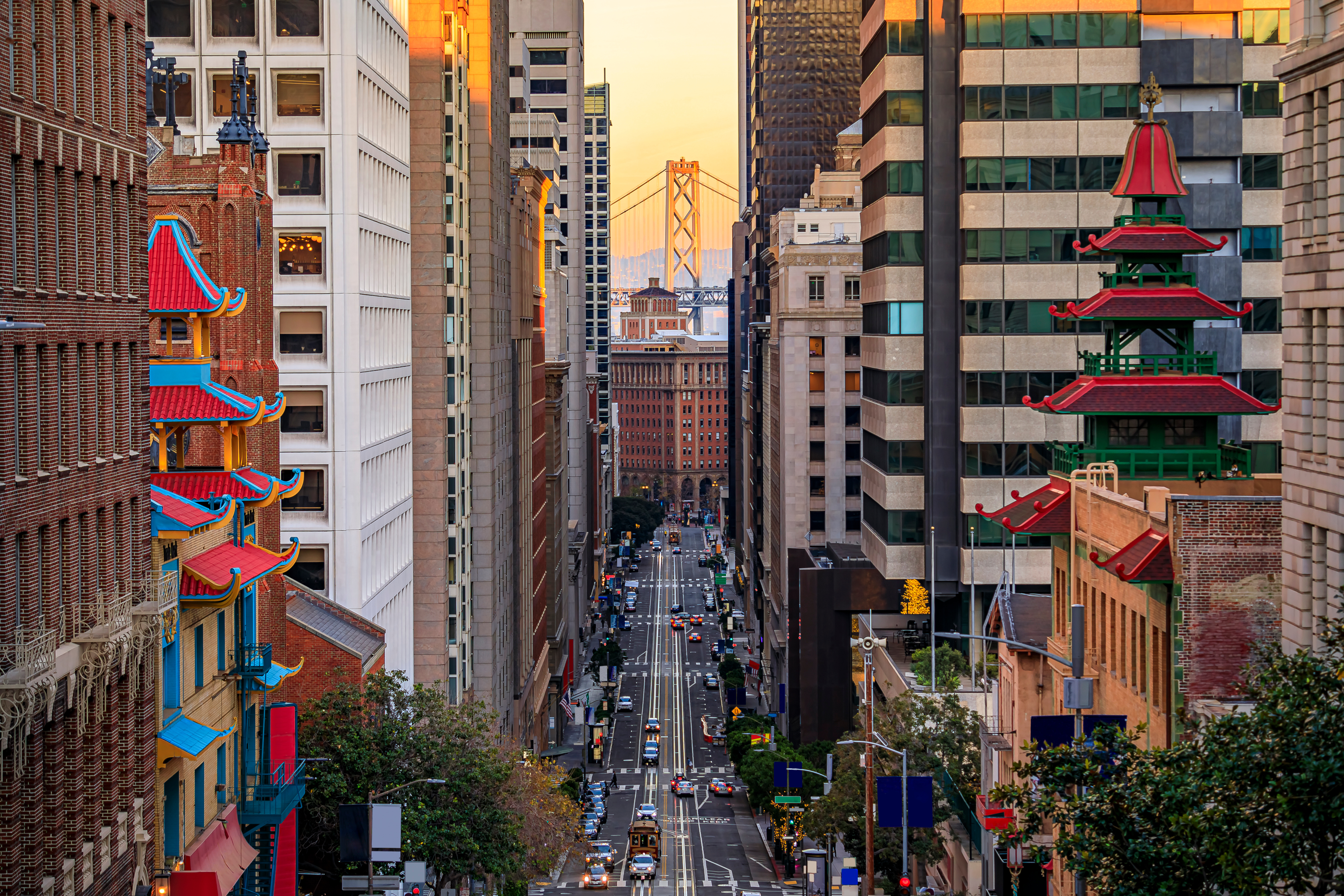 The impressive architecture of Chinatown with the Bay Bridge in the background.