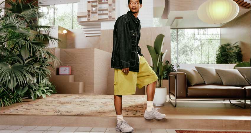 Earn Avios with New Balance. In the image, a model poses on a set with the New Balance WRPD Runner UWRPDFCA trainer model. 