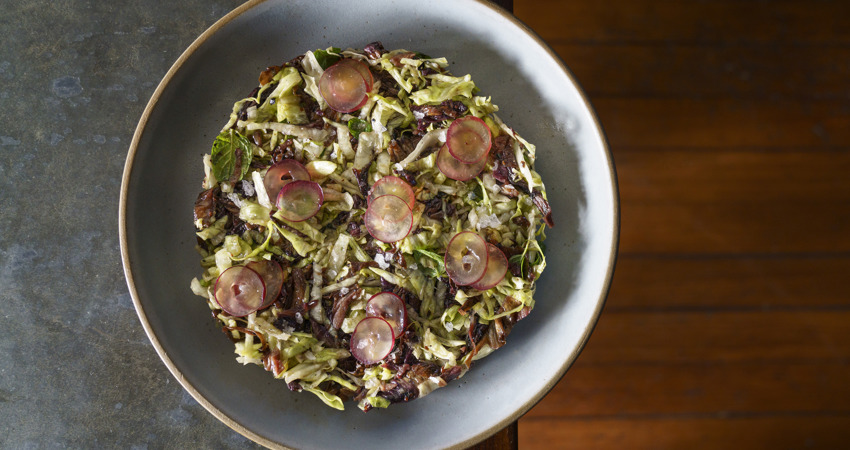 One of Mengano's vegetable dishes, presented on an icy grey plate.