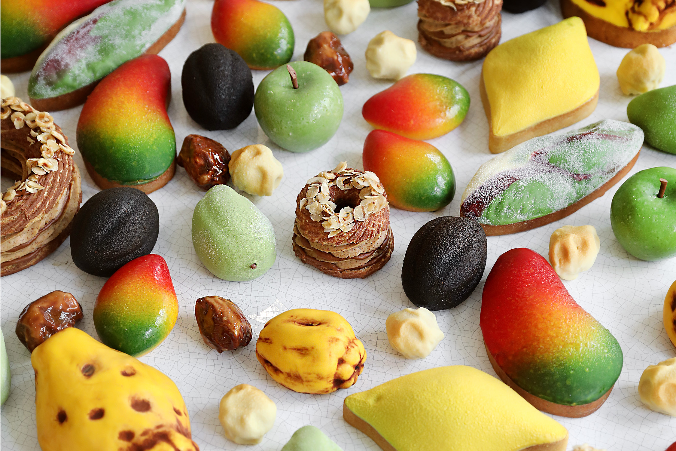 The best patisseries in Paris. Pictured here are the new trompe l'oeil creations that imitate fruits such as green apples, mangoes and dates.